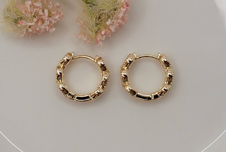 HEART SHAPED DESIGN HUGGIE EARRINGS. -RS19