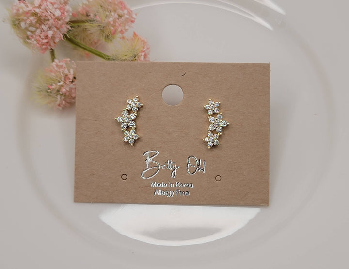 CZ MULTIPLE FLOWERS POST EARRINGS.: GOLD - HA282