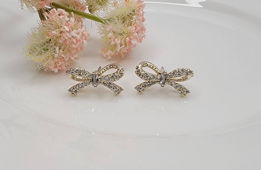 BOW CZ POST EARRINGS.: GOLD - LC117