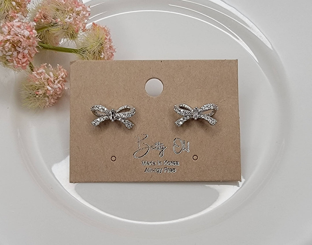 BOW CZ POST EARRINGS.: GOLD - LC117