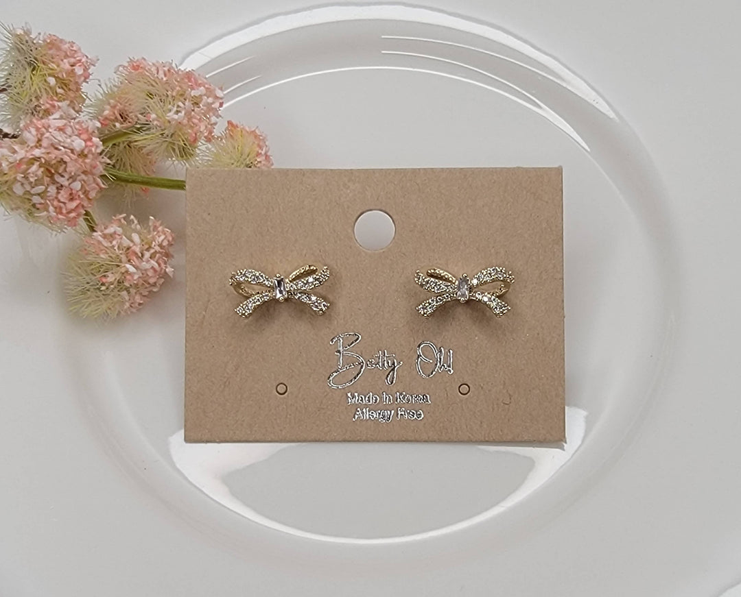 BOW CZ POST EARRINGS.: GOLD - LC117